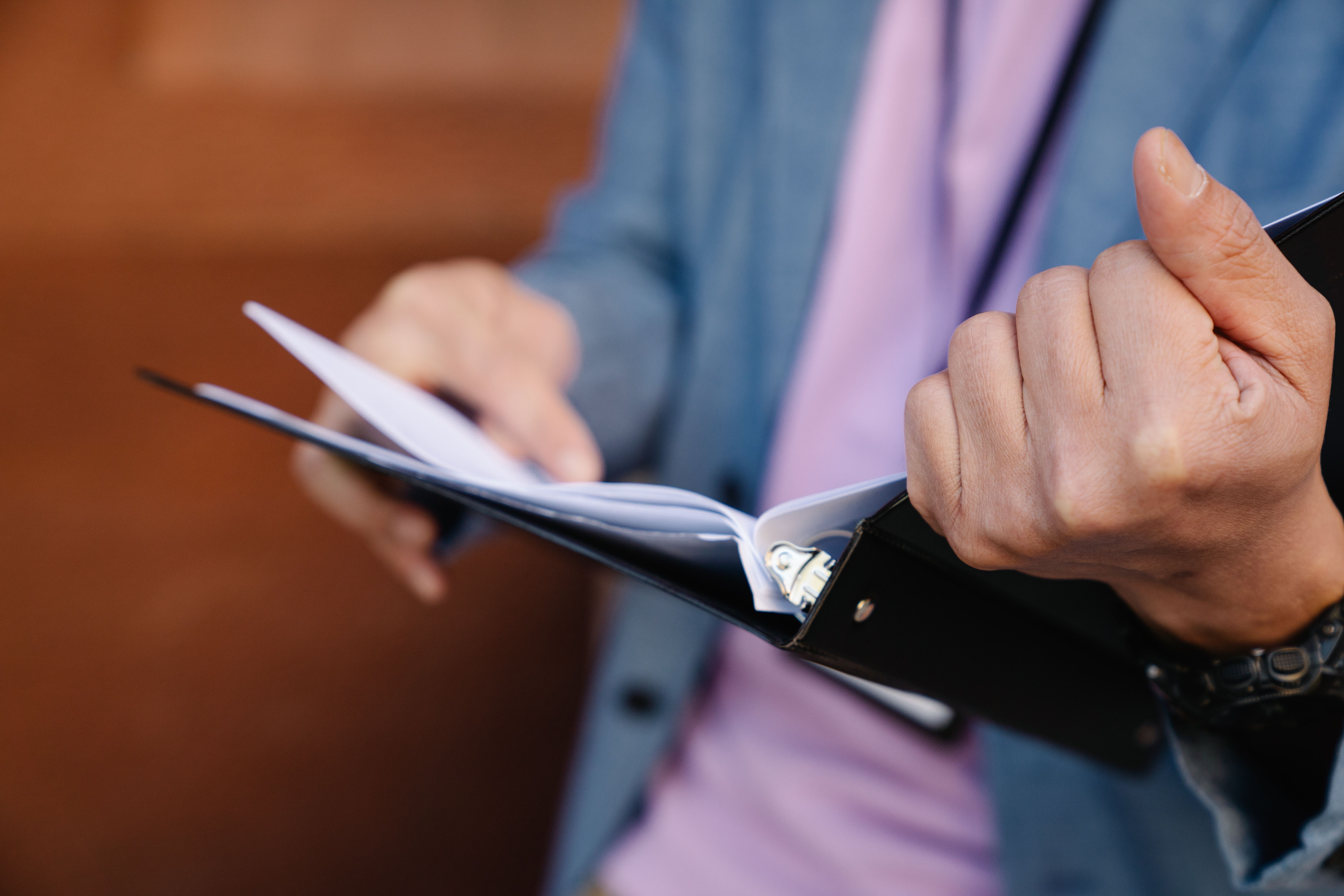 holding a binder