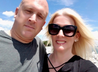 The author, Kari, with her husband at the beach