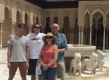 Cristina Rabadán-Diehl, her husband, and their two sons on vacation