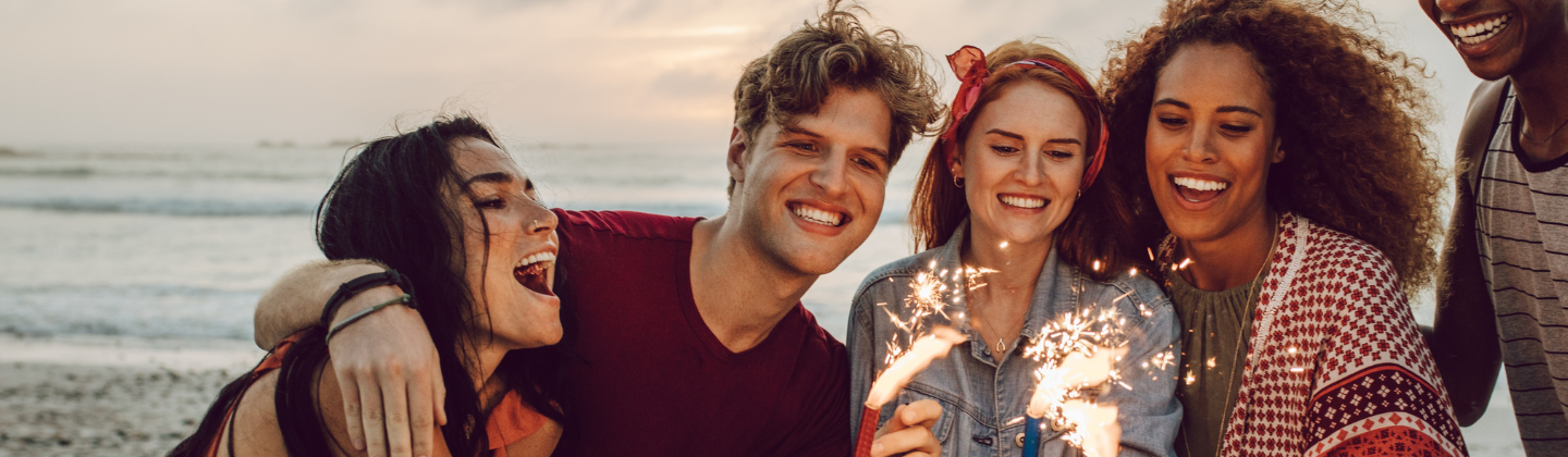 Friends hanging out on a beach