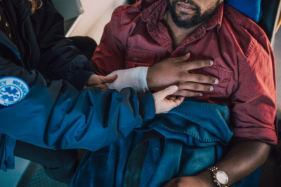 emt helping a person