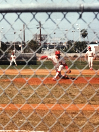 The author, pitching in a baseball game