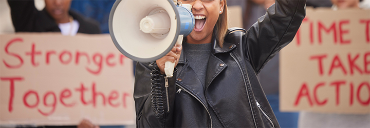 Woman holding a bull horn